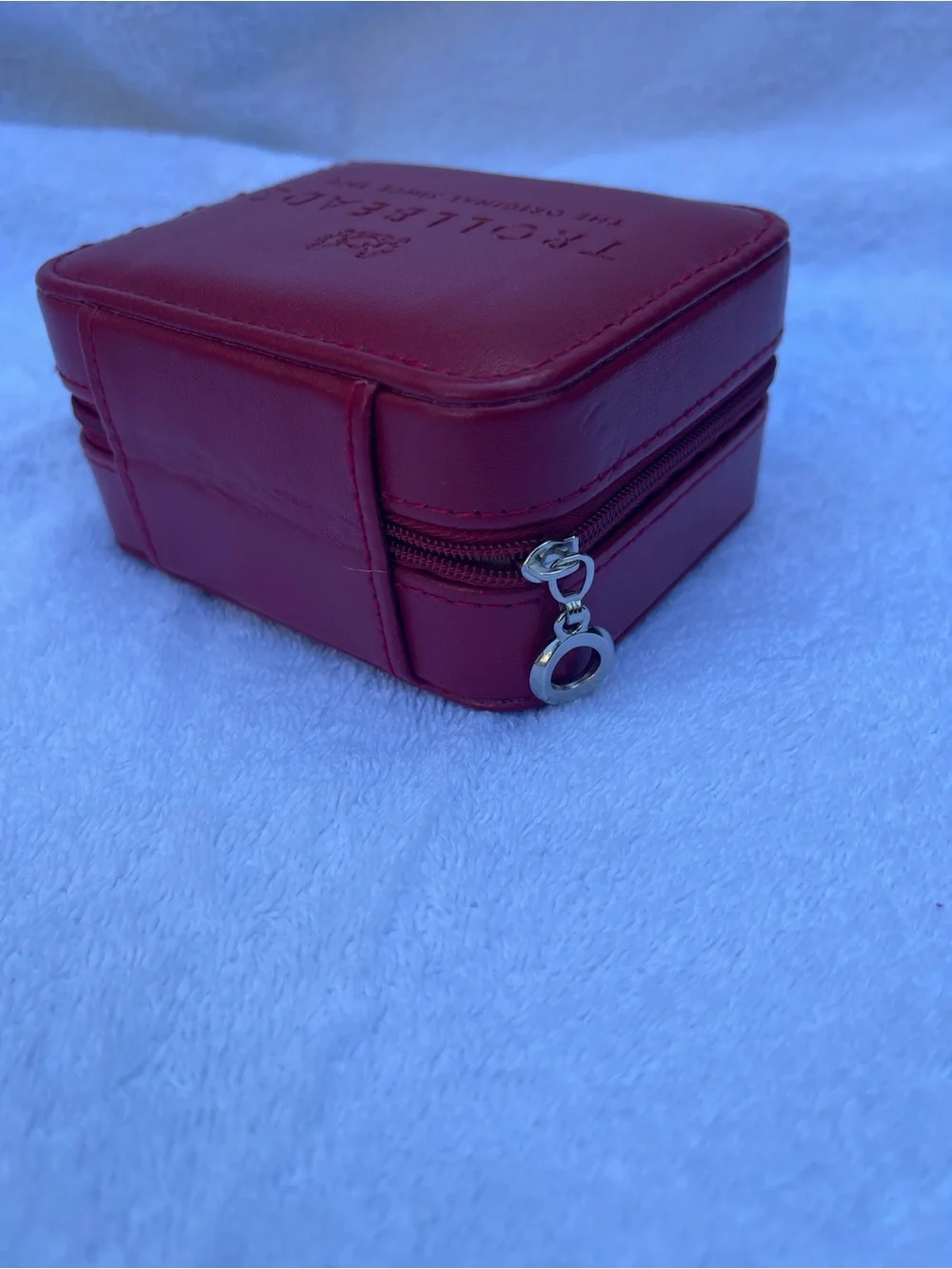 Trollbeads jewelry storage. New in plastic. Redish color.